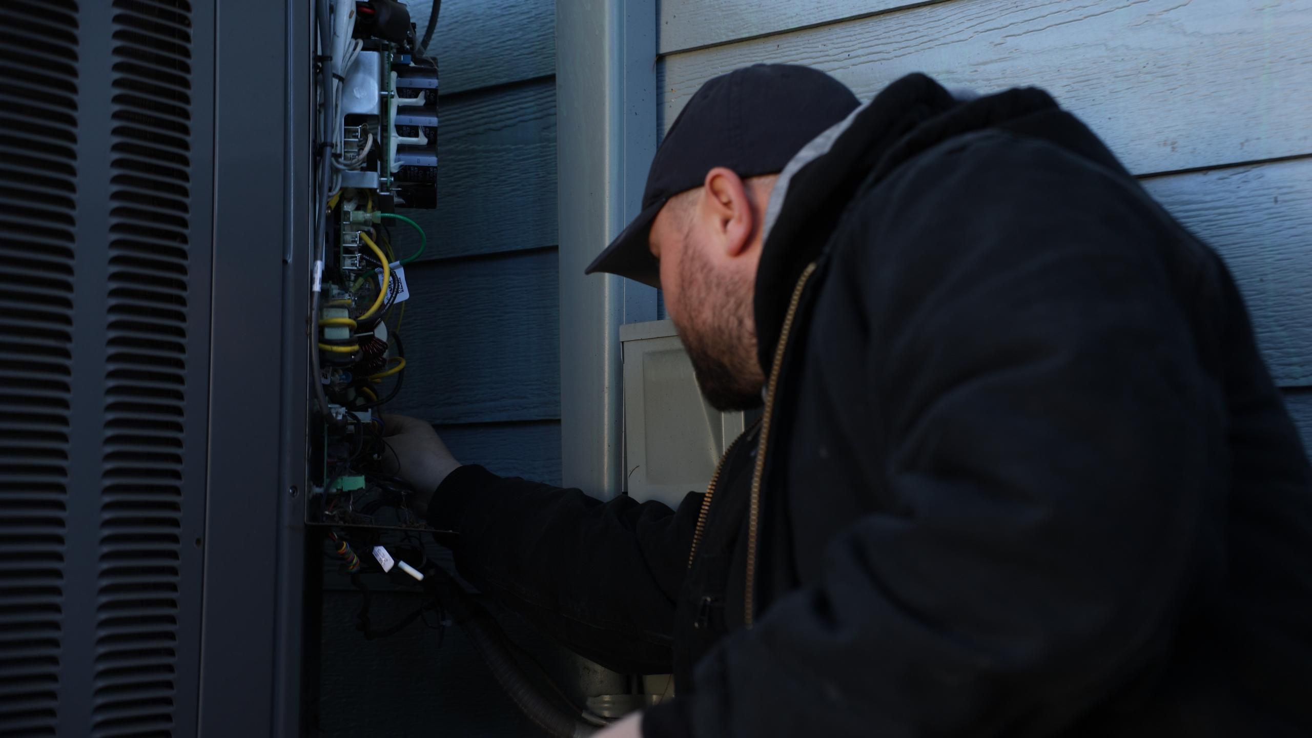 HVAC worker employee handling cables system