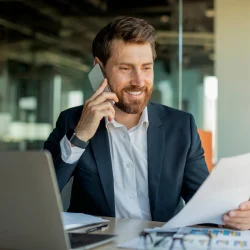 businessman on phone at warehouse